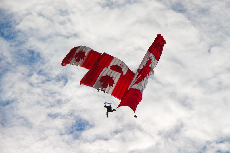 aircraft, people, relationship, person, courage, white, support, force, show, demo, brave, skydivers, three, low angle view, propeller, teamwork, aerial