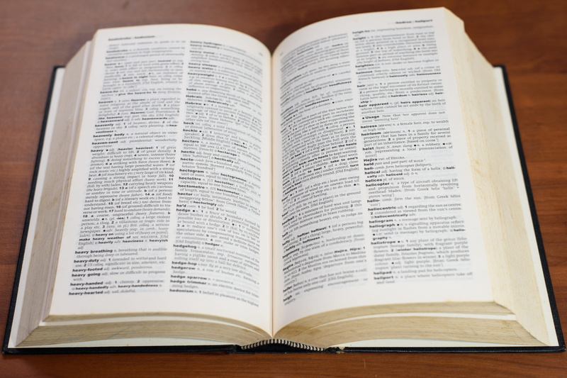 indoors, expertise, belief, knowledge, high angle view, spirituality, library, no people, publication, hardcover, education, studying, text, literary, information