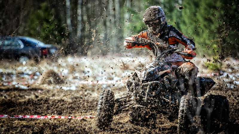 land vehicle, transportation, sport, outdoors, mode of transportation, quad, sports race, field, gray, rainy season, real people, competition, black, water