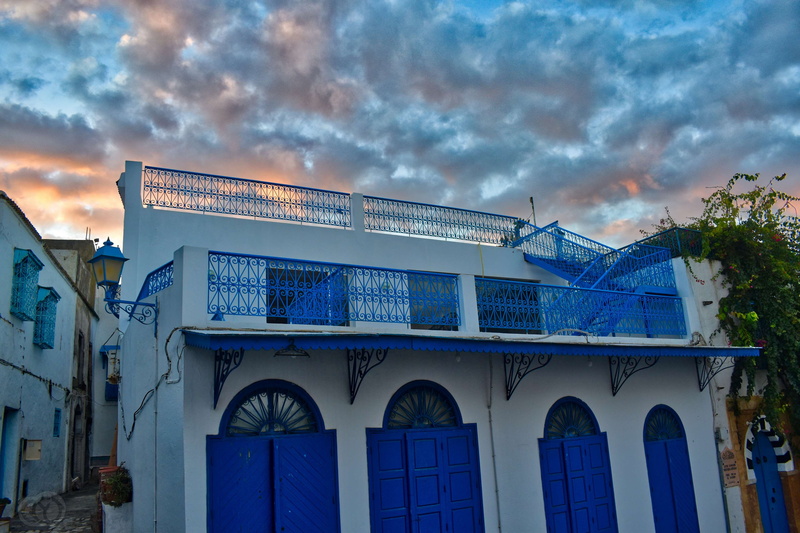 building, western script, day, cloudy sky, no people, outdoors, cloud - sky, ornate, entrance, sidi bou said, dusk, 4K, text, tunisia, building exterior