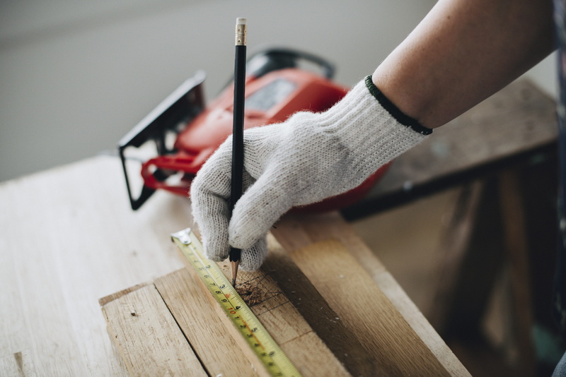 tape measure, craft, working, occupation, human hand, measuring tape, person, measuring, power tool, tool, cutting, building, men, saw, plank, glove, black