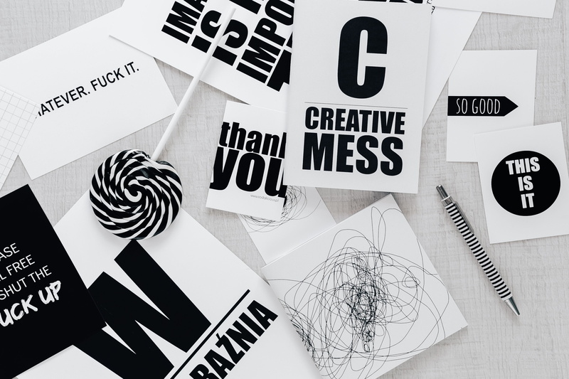 western script, flat lay, no people, group of objects, still life, monochrome, black and white, plan, communication, black, typography, studio shot, variation