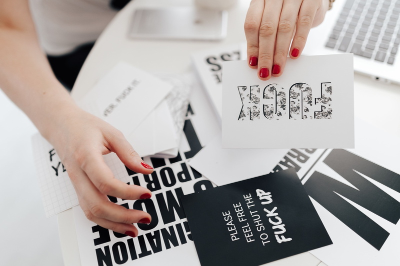 flat, one person, human body part, top, fashion, western script, adult, view, hand, sentences, close-up, text, flat lay, nail polish, desk, white, top view
