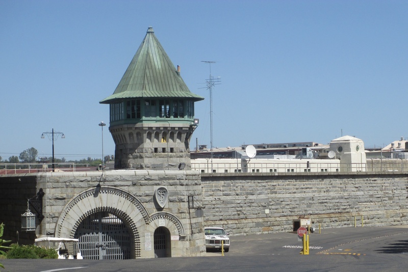 outdoors, built structure, building, sky, johnny cash, men, people, california life sentence, real people, prisoners, sunlight, full length, 2K, penitentiary