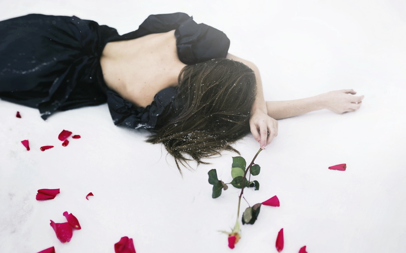 beauty in nature, black color, indoors, Love failure, adult, Petals, lying down, relaxation, one person, flower, Mood, hairstyle, flowering plant, leisure activity