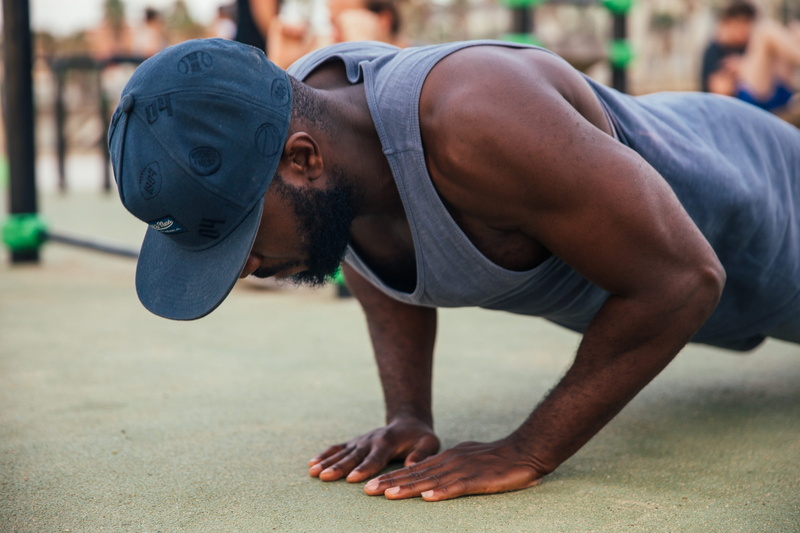 selective focus, power, muscular build, sports clothing, clothing, 25-30 year old, body conscious, health club, Urban Setting, lifestyle, determination
