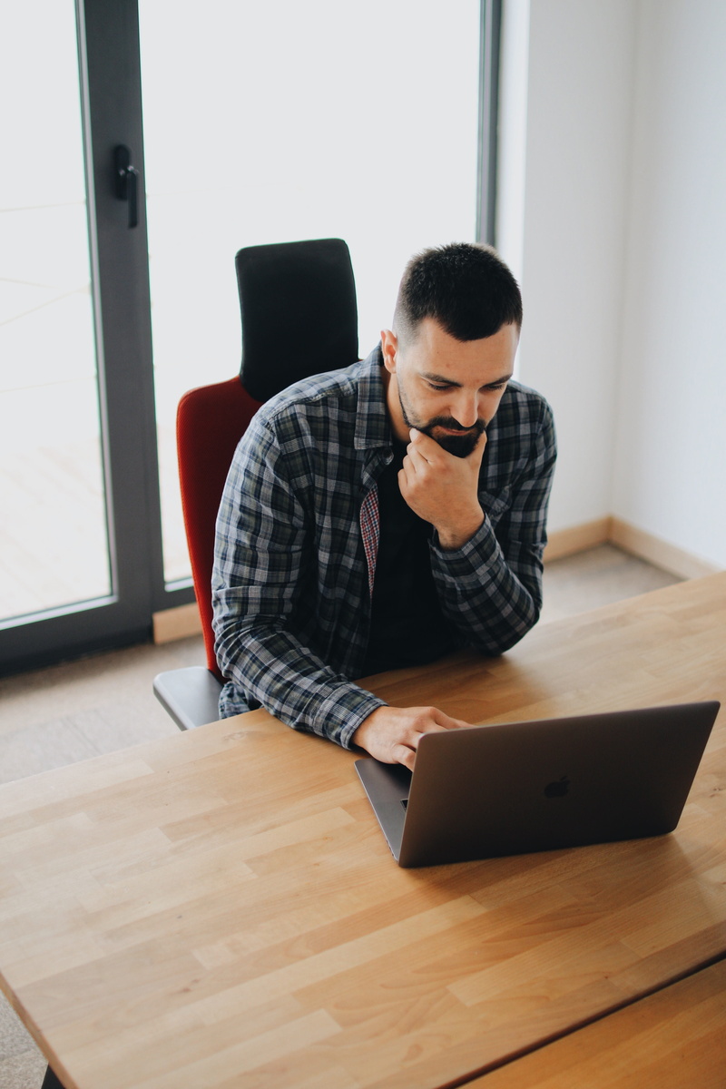 young adult, developer, looking, internet, web developer, table, furniture, connection, beard, digital nomad, 5K, room, remote work, indoors, wireless technology