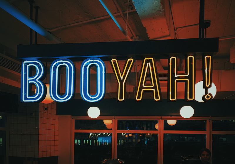 bar - drink establishment, turned, low angle view, communication, city, neon, capital letter, western script, no people, nightlife, built structure, outdoors