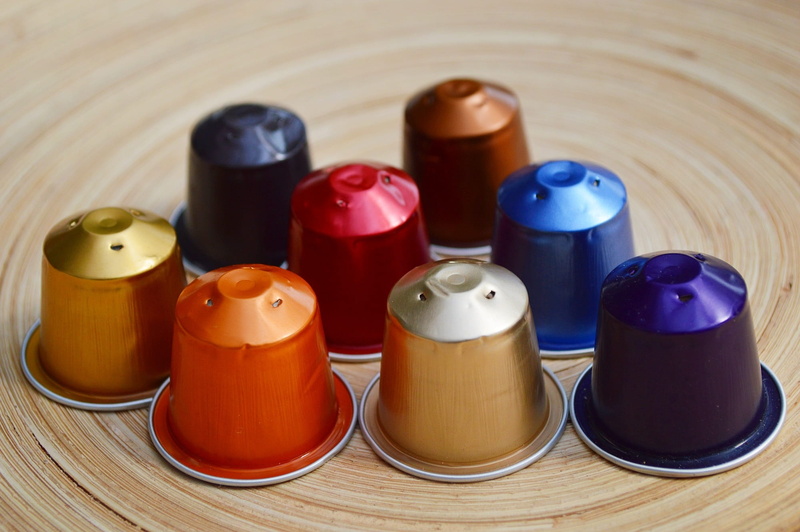 lot, four objects, group, no people, assorted, table, coffee capsule, container, variation, medium group of objects, motley, creative, red, food, arrangement
