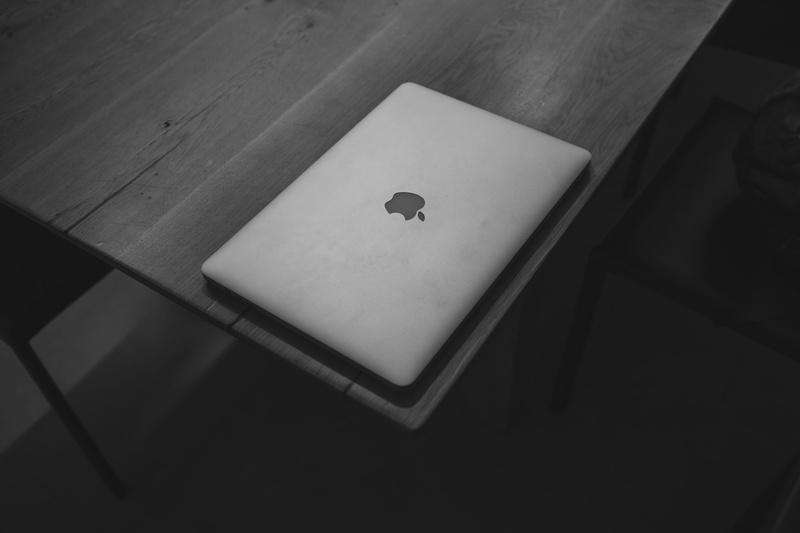 style, indoors, cards, tech, 5K, paper, arts culture and entertainment, no people, indoor, minimalism, macbook, table, presentation, white color, bw, logo