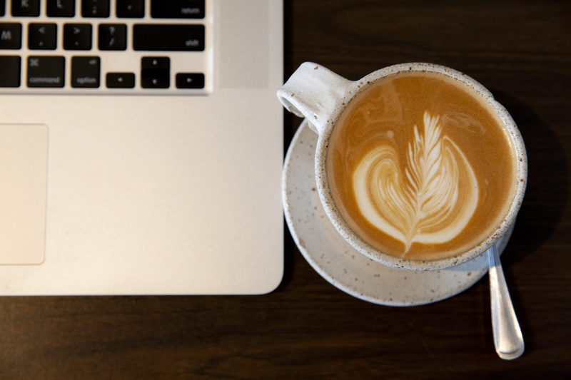 table, frothy drink, coffee - drink, no people, cup, 5K, technology, still life, computer, latte, crockery, wireless technology, indoors, drink, laptop
