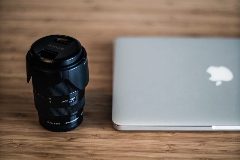 connection, black color, macbook, laptop, macbookpro, sony, desk, still life, ink, technology, close-up, pen, apple, copy space, high angle view, wood grain