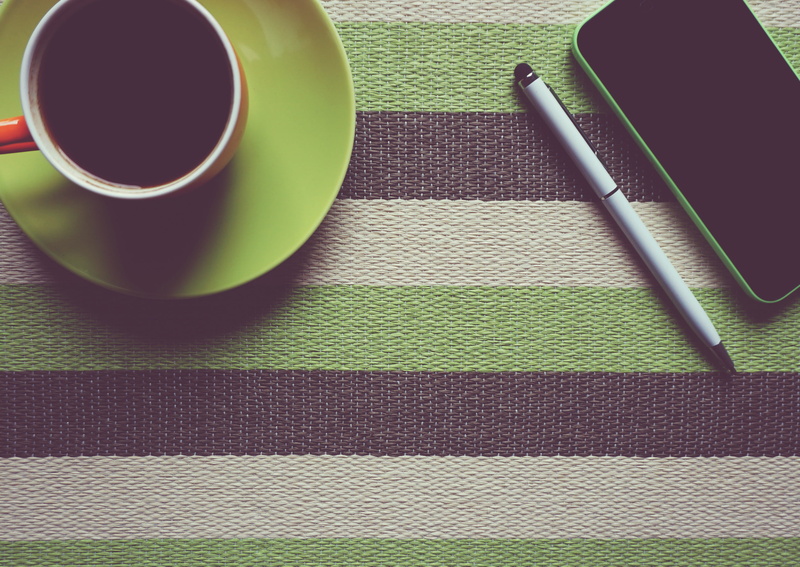 tea - hot drink, black tea, drink, indoors, tea cup, place mat, crockery, technology, striped, green, hot drink, non-alcoholic beverage, food and drink