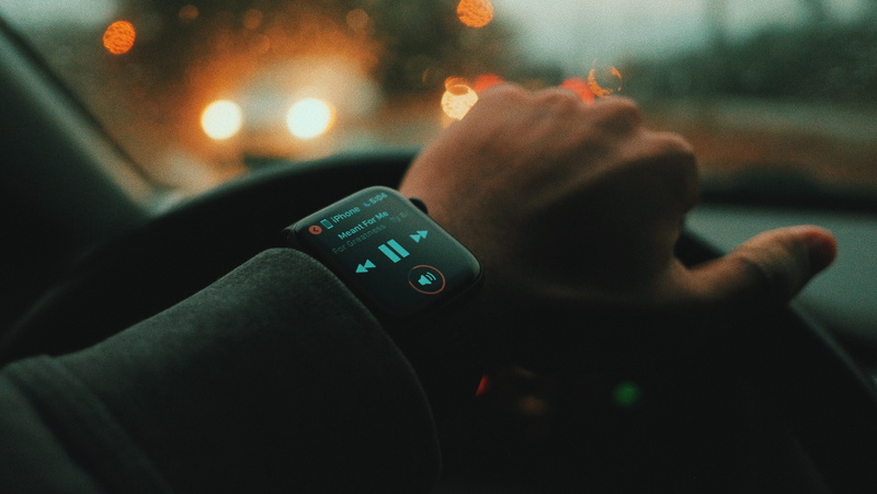electronics, cushion, human hand, finger, car, person, focus on foreground, real people, motor vehicle, technology, steering wheel, hand, lifestyles, computer