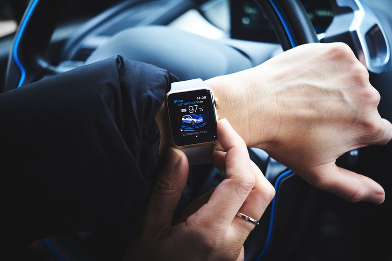 person, day, mode of transportation, finger, wearing, vehicle interior, adult, travel, vehicle, land vehicle, transportation, close-up, outdoors, communication
