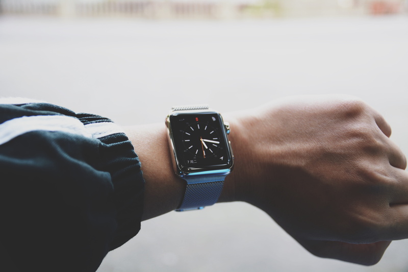 tech, adult, smartwatch, one person, human hand, person, wearing, wearable computer, checking the time, 5K, focus on foreground, photo, milanese, silver