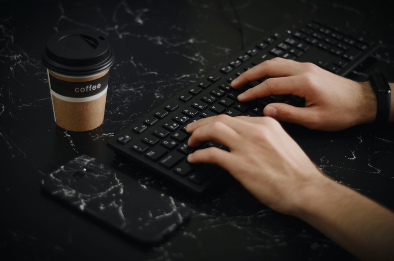 cup, design, wireless technology, laptop, one person, digital nomad, workspace, body part, hand, keyboard, finger, smartphone, using, human hand, hands