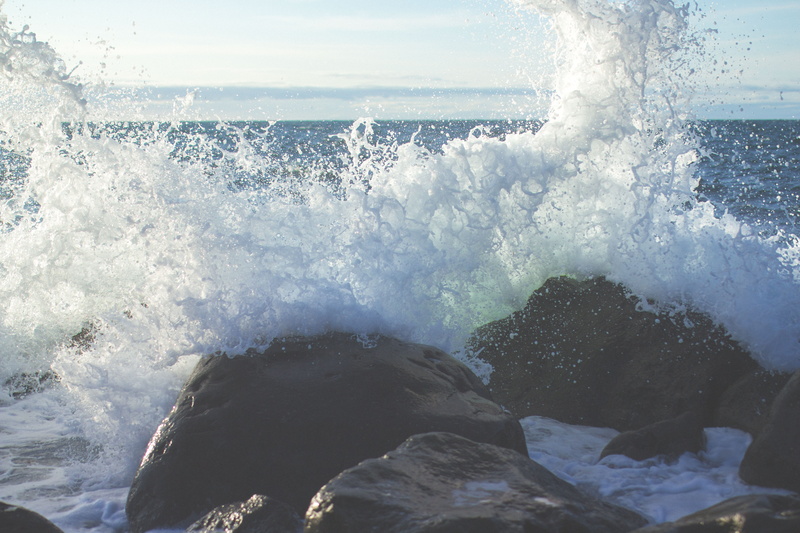 sea, hitting, power in nature, tide, coastline, rock, water, aquatic sport, spray, rocks, no People, breaking, wave, surf, blue, seascape, power, outdoors