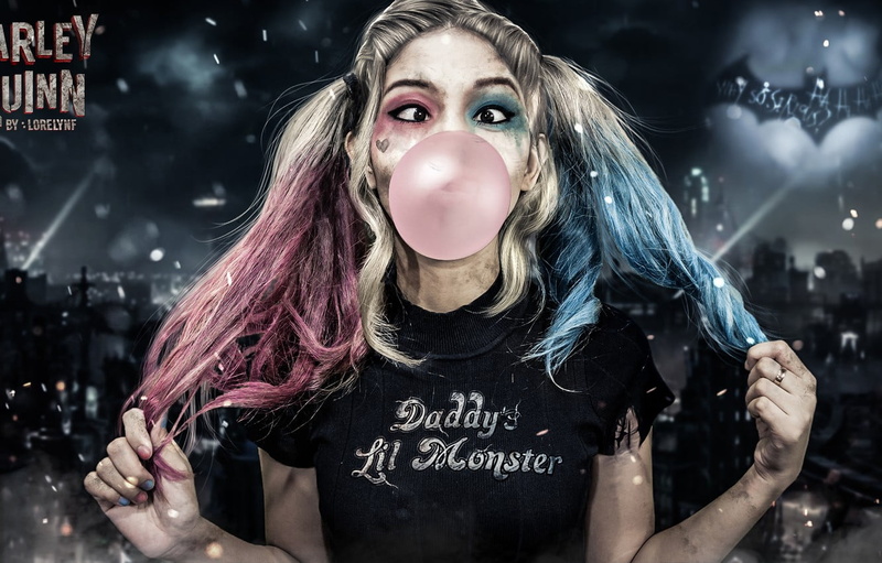 sky, shirt, dark eyes, dyed hair, Harley Quinn, makeup, black t-shirt, touching hair, holding hair, watermarked, Batman, long hair, hair pulling, rings