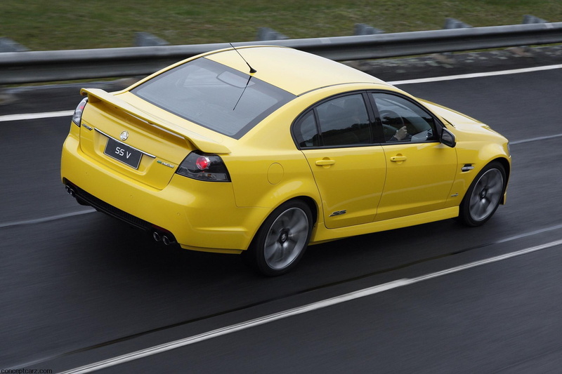 ii, yellow, land vehicle, taxi, 1080P, car, transportation, holden, city, motion, architecture, high angle view, yellow taxi, street, outdoors, ve, day