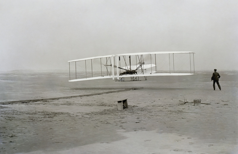 beauty in nature, extreme weather, sky, fly, near, men, biplane, person, fog, inventor, invention, land, take off, glide, rain, architecture, built structure