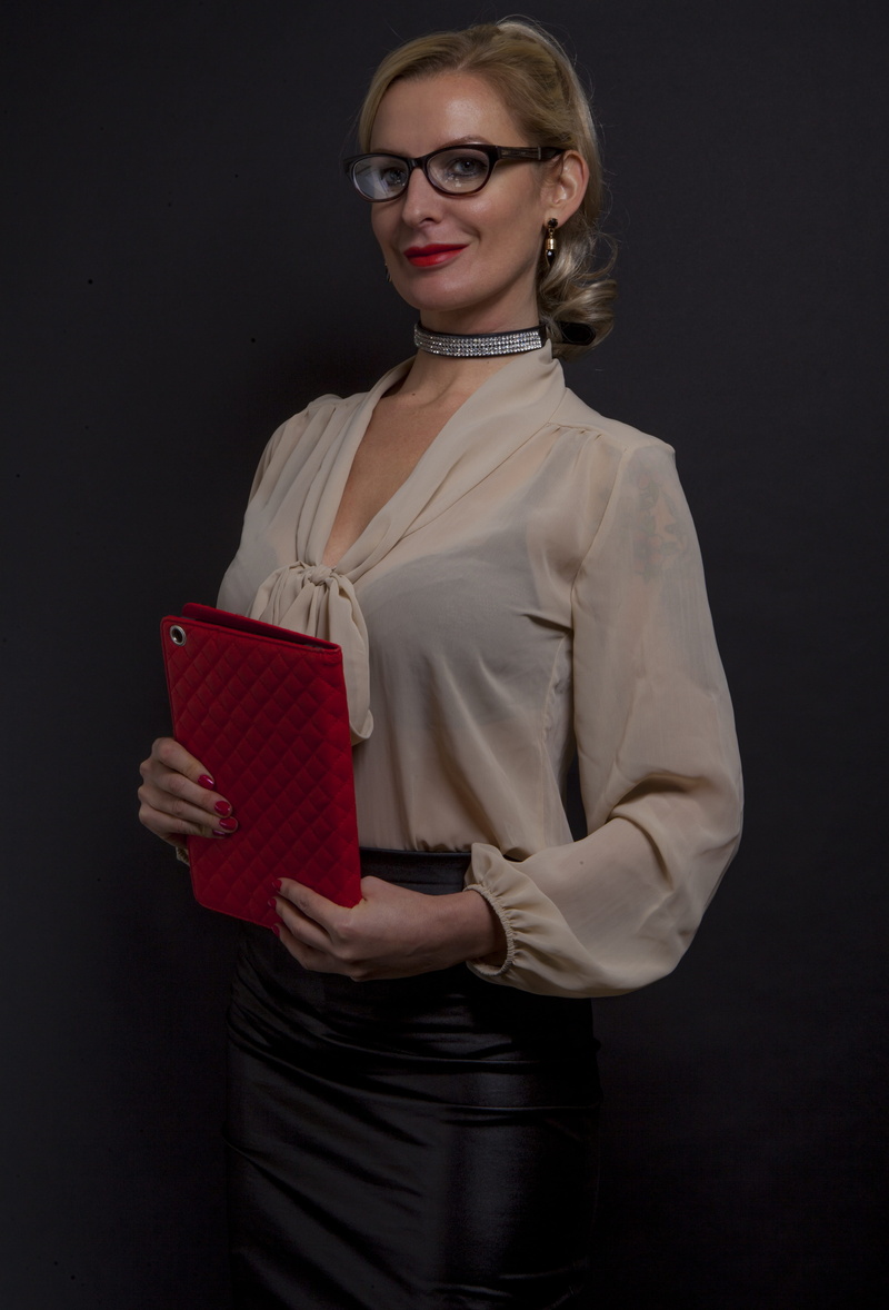 standing, cut out, black background, glasses, one person, adult, smiling, lady, hairstyle, women, ipad, beautiful woman, indoors, young adult, portrait