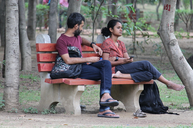 friendship, men, relaxation, two people, tree, males, adult, outdoors, asia, front view, full length, leisure activity, bench, couple, relationship, conflict
