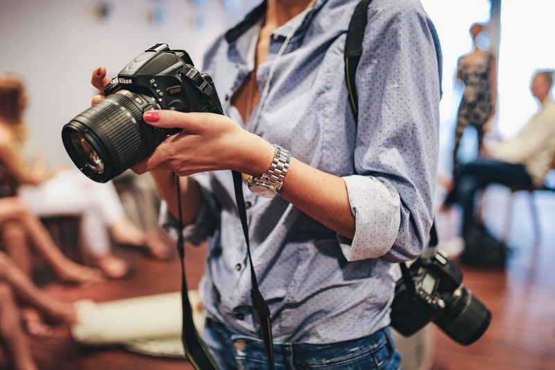 holding, adult, photographic Equipment, equipment, real people, caucasian Ethnicity, incidental people, one woman only, camera - Photographic Equipment