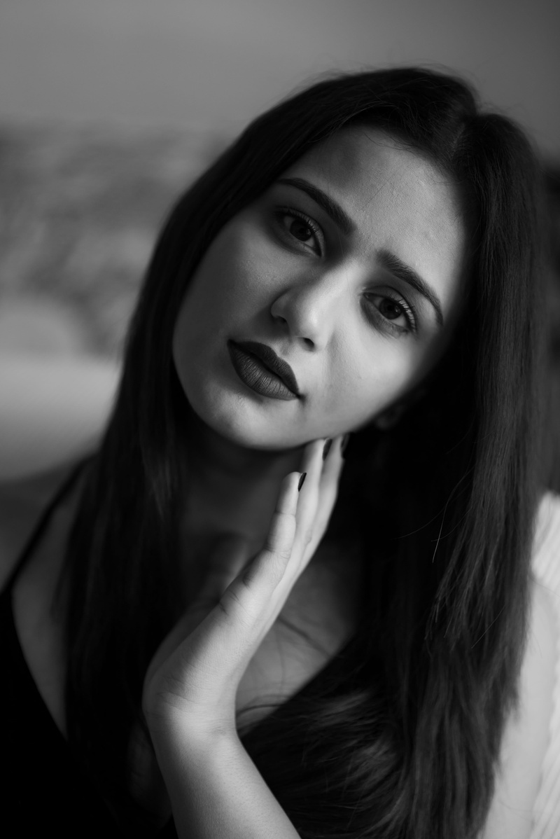 hair, beautiful woman, place, contemplation, headshot, adult, lifestyles, one person, focus on foreground, portrait, close-up, looking at camera, innocent