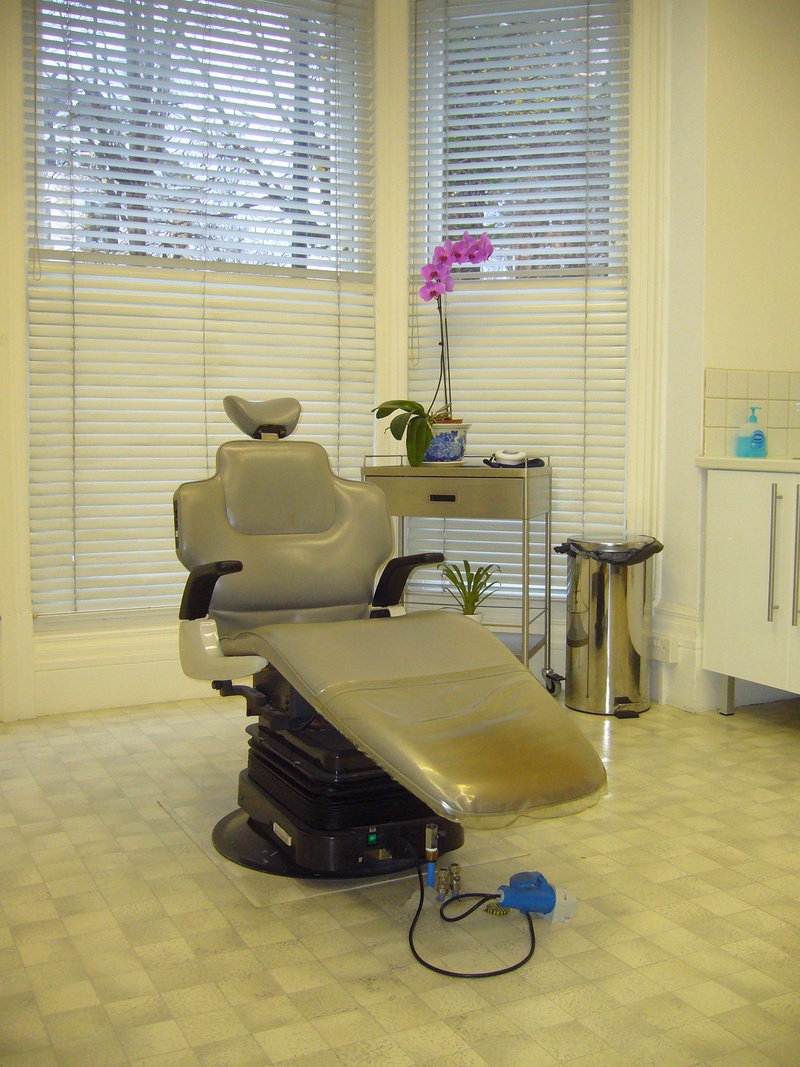 dentistry, glass - material, dentist, chair, day, seat, patients, orthodontist, no people, home interior, health, blinds, healthcare and medicine, flooring
