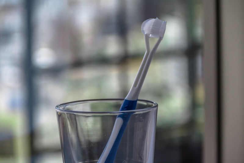 focus on foreground, household equipment, container, teeth, kitchen utensil, day, dental care, smiling, food and drink, drink, mouth, 4K, smiles, glass