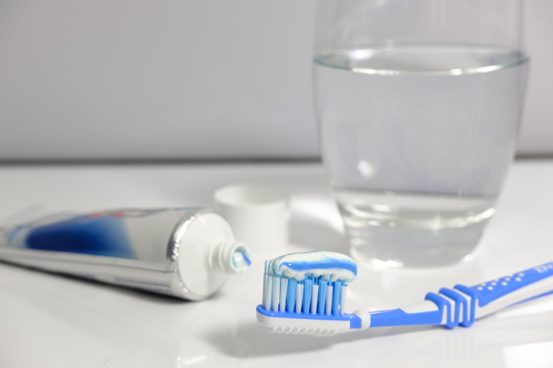 brushing teeth, science, white, table, fluoride, dental care, tube, brush head, white color, poison from the tube, toothpaste, dental hygiene, close-up