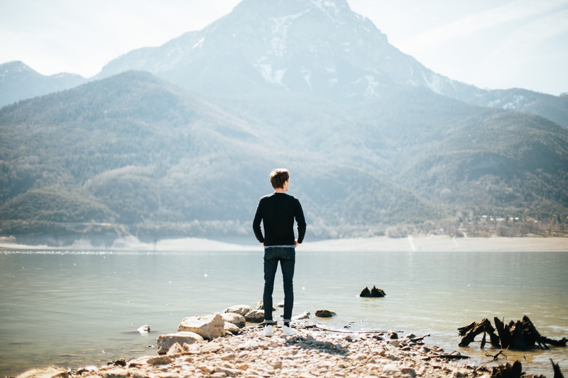 rear view, nature, depressed, rock, discover, tranquility, standing, non-urban scene, water, achieve, full length, 5K, solid, rock - object, hopeful, determine