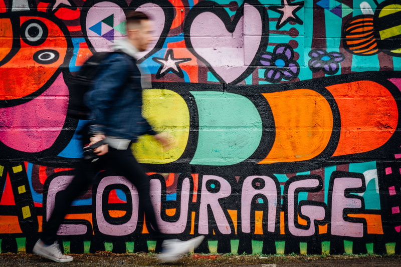 inspire, real people, passion, quick, art and craft, color, one person, brave, graffiti, push, leisure activity, speed, text, blurred motion, web design