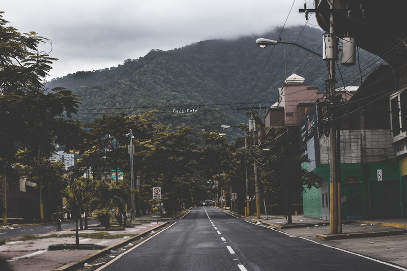 road, vsco, nature, electricity, tree, street, built structure, direction, marking, honduras, vintage, san pedro sula, diminishing perspective, sign, mountain