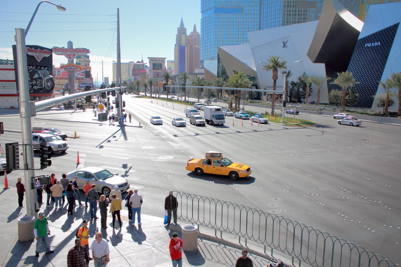 office building exterior, cab, landmark, horizontal, yellow, mode of transportation, Nevada, usa, Vegas, day, taxi, street, building exterior, gambling