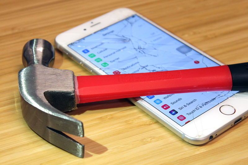 broken, work tool, wood - material, still life, iphone, metal, close-up, equipment, no people, apple, screen, tool, smartphone, number, table, focus on foreground