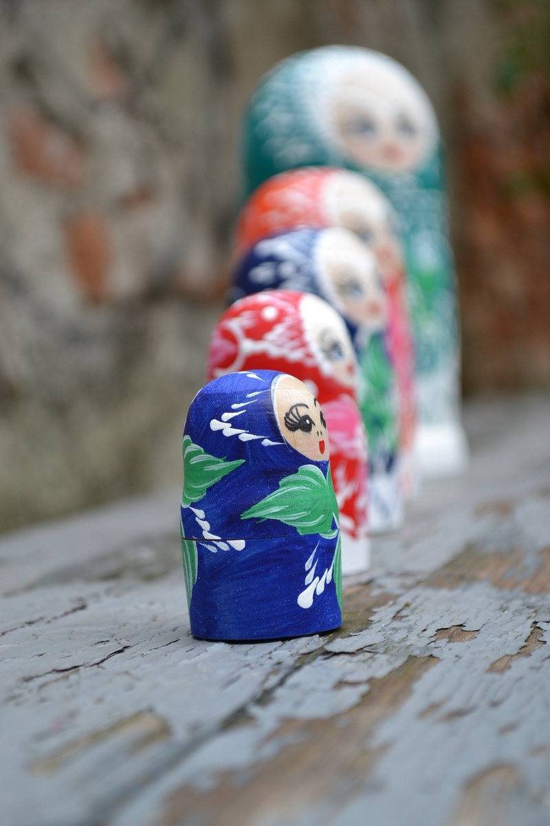 representation, doll, 1080P, ethnicity, babushka, animal themes, blue, tree trunk, outdoors, animal representation, day, matrioska, selective focus, toy