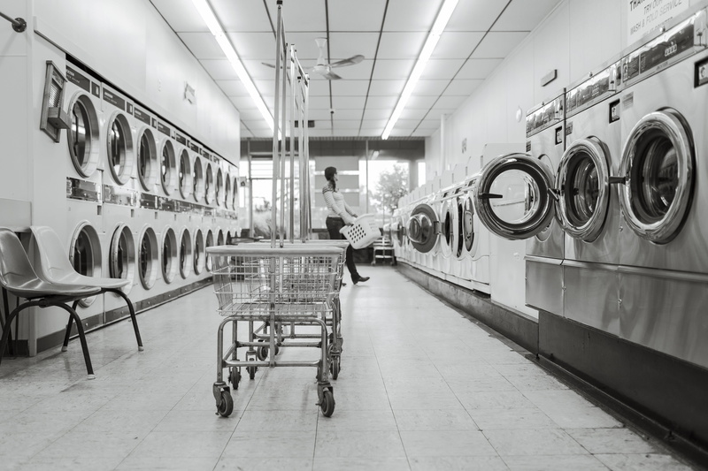 washing machine, clothing, appliance, waiting, lifestyles, black-and-white, clean, student, washer, indoors, adult, photography, hygiene, laundromat, men