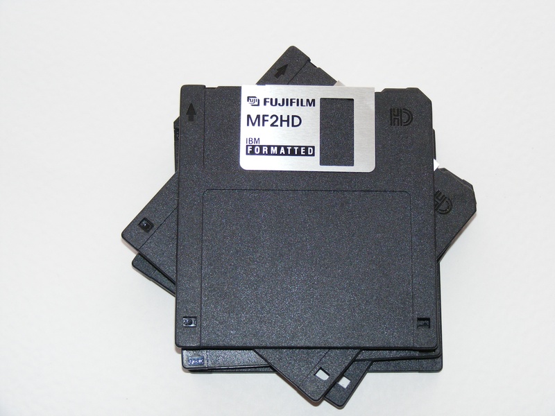 technology, studio shot, colored background, western script, disk, cut out, floppy, formated, white background, close-up, communication, high angle view