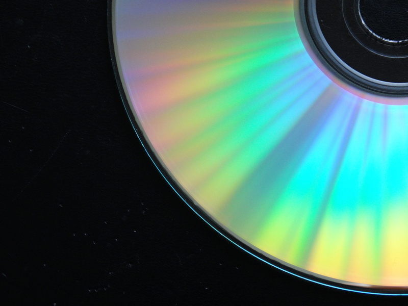 electrical equipment, Dvd, lens - optical instrument, air vehicle, music, optical instrument, close-up, motion, Floppy Disk, Computer, arts culture and entertainment