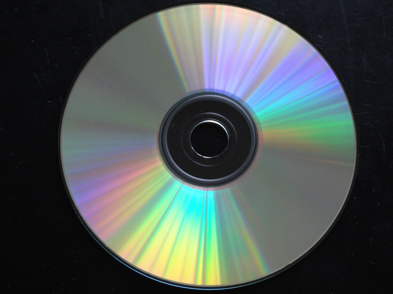 music, geometric shape, multi colored, spinning, technology, close-up, motion, circle, cd, dvd, no people, indoors, the media, data, electrical equipment