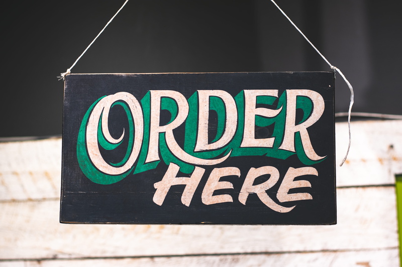 communication, business, close-up, capital letter, order, outdoors, western script, message, design, food and drink, board, wood - material, text, display