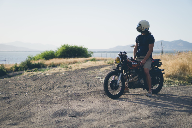 people, headwear, land vehicle, motorcycle, neck, nature, crash helmet, road trip, leisure activity, body, black, adults only, sports helmet, mountain