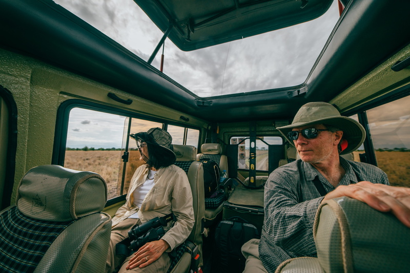vehicle seat, passenger, people Traveling, only men, old-fashioned, people, jeep, caucasian, sunglasses, land Vehicle, caucasian Ethnicity, daytime, males