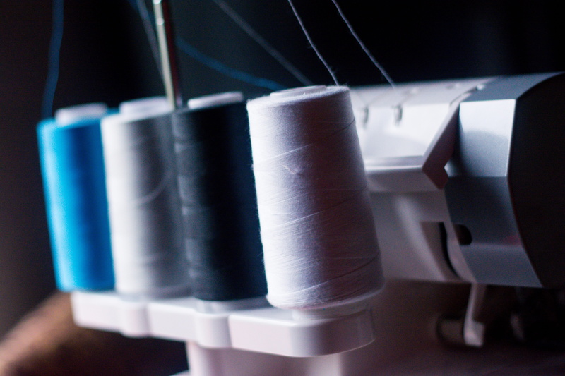 blue, Yarn, machinery, in a row, indoors, Thread, color, Sewing Machine, black color, metal, neck, focus on foreground, threads, machine, assorted, string