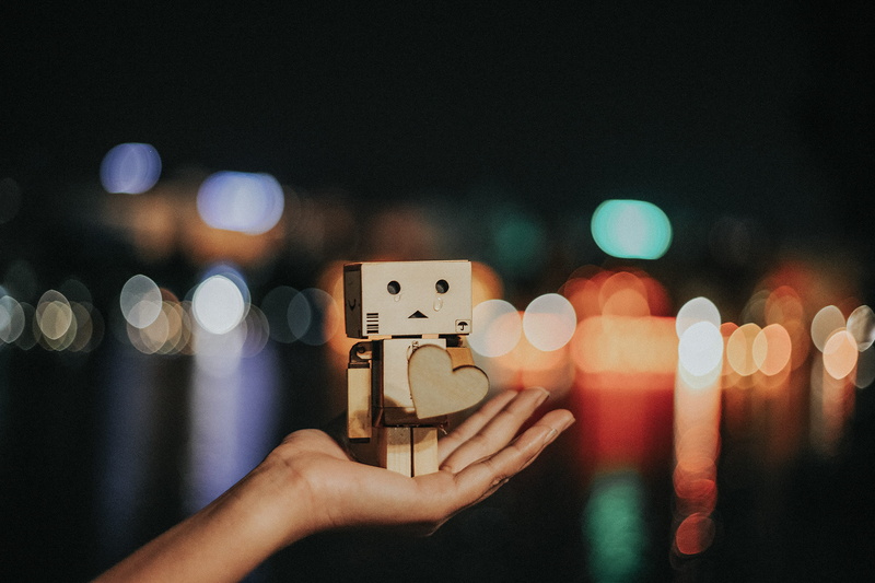 holding, bokeh, finger, unrecognizable person, human limb, hanoi, city, lifestyles, person, human hand, hand, photography themes, wireless technology