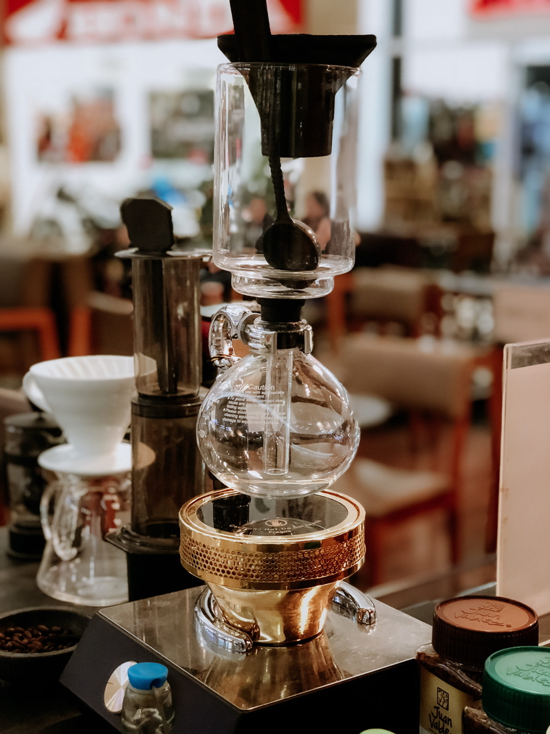 coffee maker, drink, instrument of measurement, no people, focus on foreground, bong, technology, table, container, food and drink, group, indoors, vacuum coffee maker