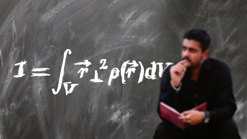 formula, black, learning, teaching, teacher, chalk, sign, standing, mass moment of inertia, volume, university, mathematics, professor, holding, man, text