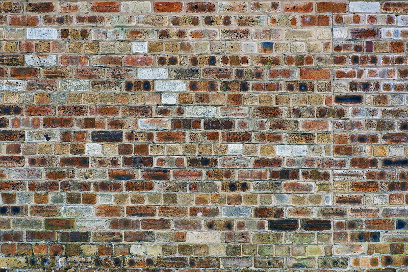 wall, backgrounds, moss, black, low angle view, full frame, textured, stone material, building, pavement, brick wall, brick, face, stone wall, outdoors